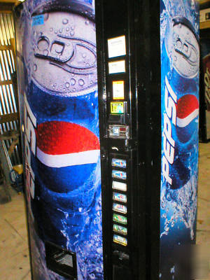 Dixie narco 600 bubble front soda vending machine..