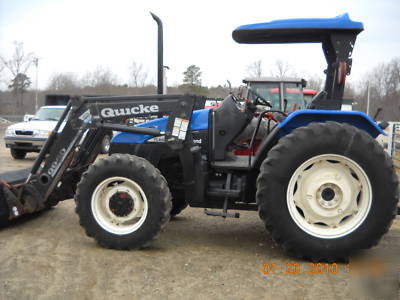 New holland TL100 with 960 loader 