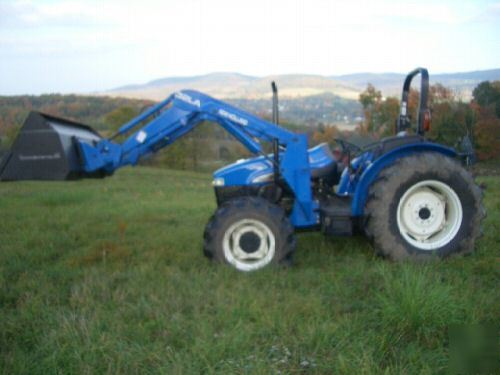 New 04 holland TN65 4WD with loader only 74HRS.