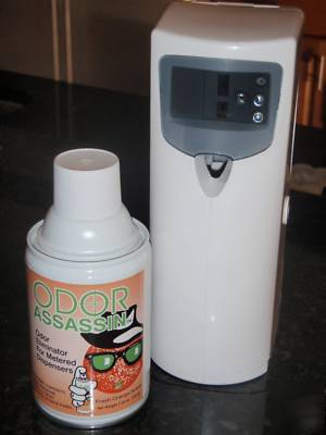 Stratus air freshener dispenser + orange scent refill 