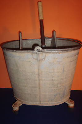 Vintage steel oval mop bucket wringer by geerpress co.