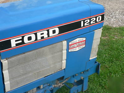 New 4WD ford/ holland 1220 with 60 inch mower deck