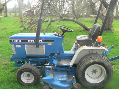 New 4WD ford/ holland 1220 with 60 inch mower deck