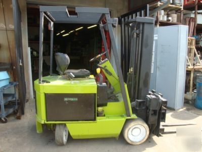 Clark electric fork lift with 360' rotating forks