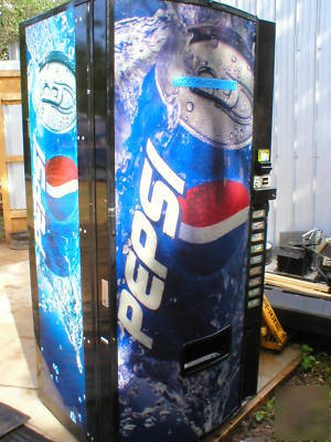 Dixie narco 600E multi-price soda vending machine..