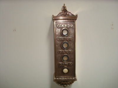 Antique brass elevator push buttons, restored