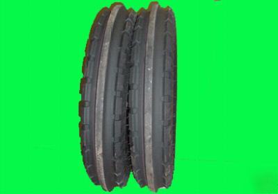Two 6.00-16 old style john deere front tractor tires