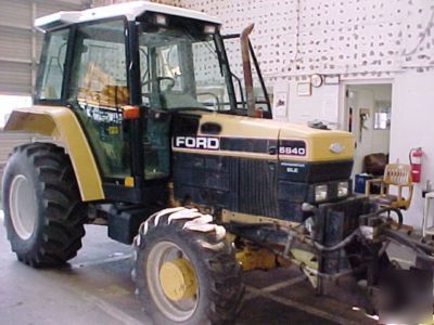 1994 ford 6640 tractor with push broom attachment