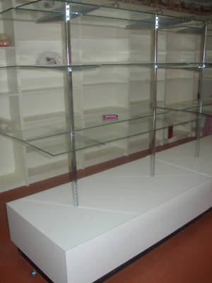 2 white laminate display islands with glass shelves