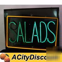 Commercial bar hanging neon lighted 'salads' sign