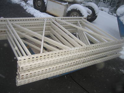 4 sections hd pallet racks , approx 32' l x 8' tall