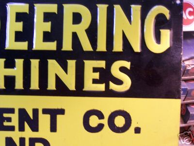 Mccormick-deering tin advertising sign