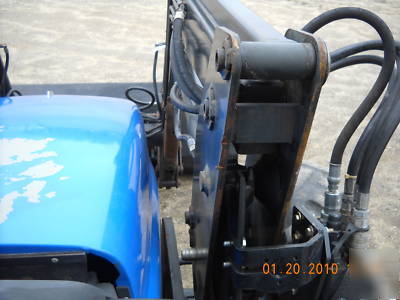 New holland TL100 with 960 loader 