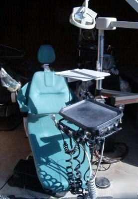 Dentist equipment + belmont chairs + dental assistant +