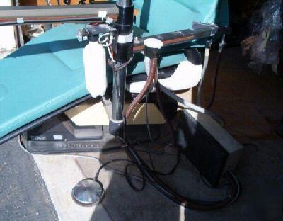 Dentist equipment + belmont chairs + dental assistant +