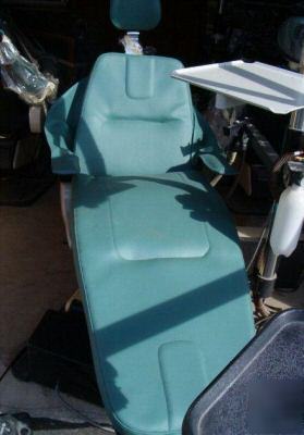 Dentist equipment + belmont chairs + dental assistant +