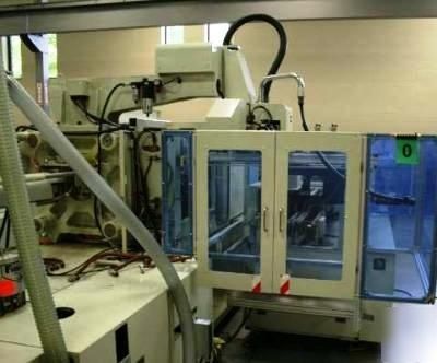 180 ton, 10.7 oz. sumitomo injection molding machine'95