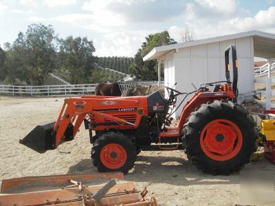 Kubota L4300 dt loader, scraper,mower,auger and grinder