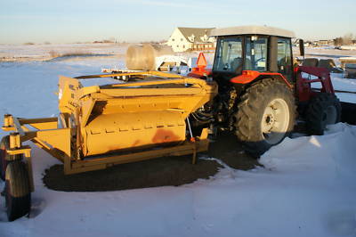 Bale buster for tractor. for large round bales