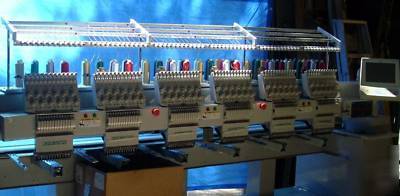 Lightly used aemco 6 head 12 needle embroidery machine