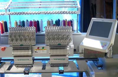 Lightly used aemco 6 head 12 needle embroidery machine