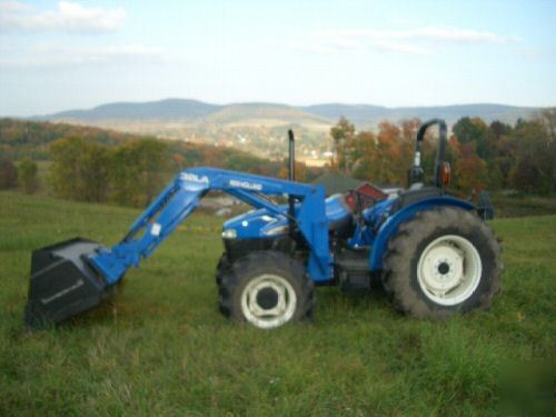 New 04 holland TN65 4WD with loader only 74HRS.