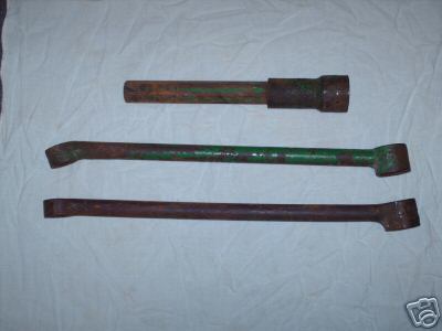 Three piece john deere wheel wrench set. a, b, 60, 730 