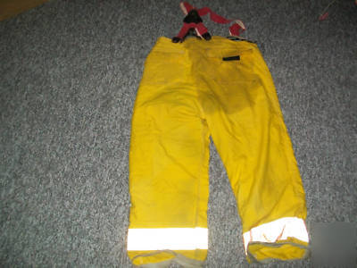 Fire fighter gear, pants, coat, gloves, baton, and bag 