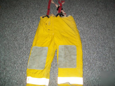 Fire fighter gear, pants, coat, gloves, baton, and bag 