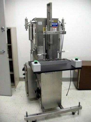 National dab-32-2 head piston filler filling machine. 