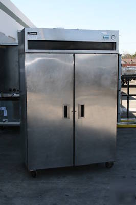 Delfield 2 door reach in freezer on casters 