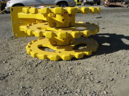 Yellow 22 inch compactor wheel trenchmaster backhoe