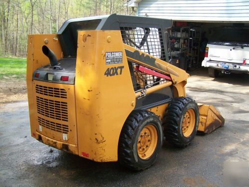 New 2002 case 40XT skid loader,900 hours, bucket, forks