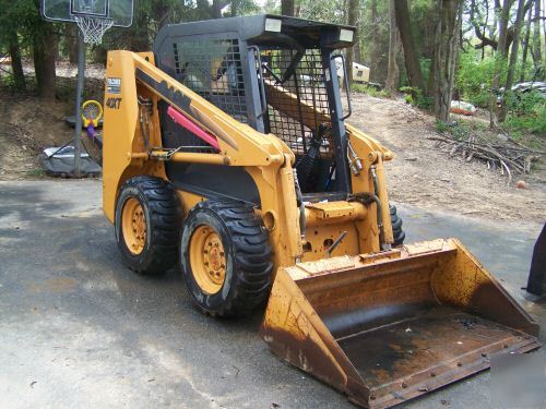 New 2002 case 40XT skid loader,900 hours, bucket, forks