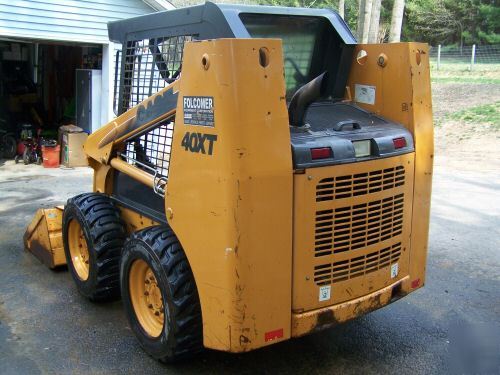 New 2002 case 40XT skid loader,900 hours, bucket, forks