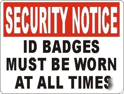 Security notice id badges must be worn all times sign