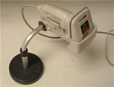 Symbol LS1006-1000 spark hand scanner w/ stand