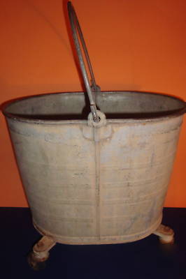 Vintage steel oval mop bucket wringer by geerpress co.