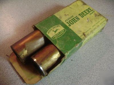 New john deere nos b piston pins old stock