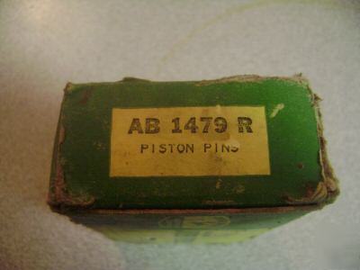 New john deere nos b piston pins old stock