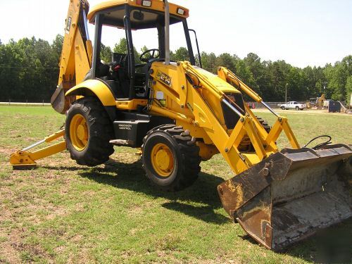 2004 jcb 214 extenda hoe 4X4 with a 4 in 1 front bucket