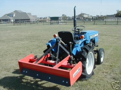 Mitsubishi D1500II tractor (with box blade)