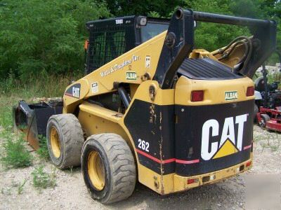 03 caterpillar 262 skid loader,aux. hyd, grapple rake