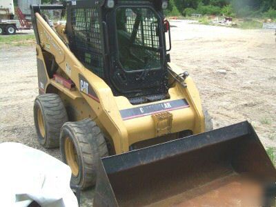 03 caterpillar 262 skid loader,aux. hyd, grapple rake