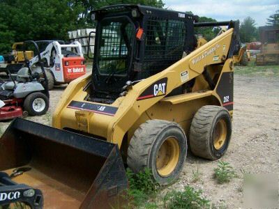 03 caterpillar 262 skid loader,aux. hyd, grapple rake