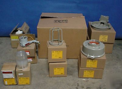 Large lot of industrial lighting nos