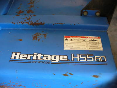 05 massey fergusion 1533 with 4 wd. & woods brush hog