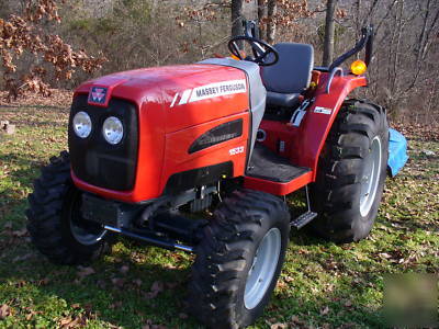 05 massey fergusion 1533 with 4 wd. & woods brush hog
