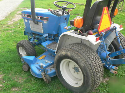 New 4WD ford/ holland 1220 with 60 inch mower deck