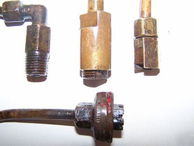 Orig hit miss gas engine fuel check valves steam oiler